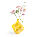 Yifan Renxu dice vase in an iridescent golden-yellow and pearlescent glaze, balanced on one corner