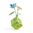 Yifan Renxu dice vase in an iridescent opal-green, turquoise and gold glaze, balanced on one corner