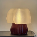 Deep red Studio.LUNA L001 lamp switched on, warm light through the 3D printed cloud shade