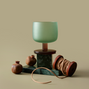 Antigua wine glass with a pistachio-green frosted bowl and rose-tinted stem